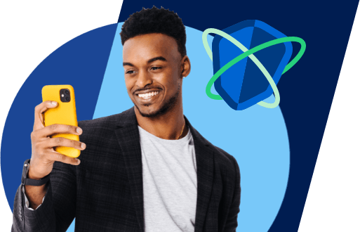 a man in a blazer and tshirt smiles at a yellow phone in his hand